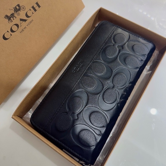 Coach Handbags - COACH Embossed Signature Black Leather Long Accordion Zip Wallet